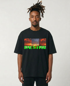 Man wearing a black t-shirt with a colorful graphic and text on a plain background