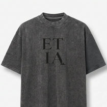 Gray t-shirt with 'ETIA' text on a white background