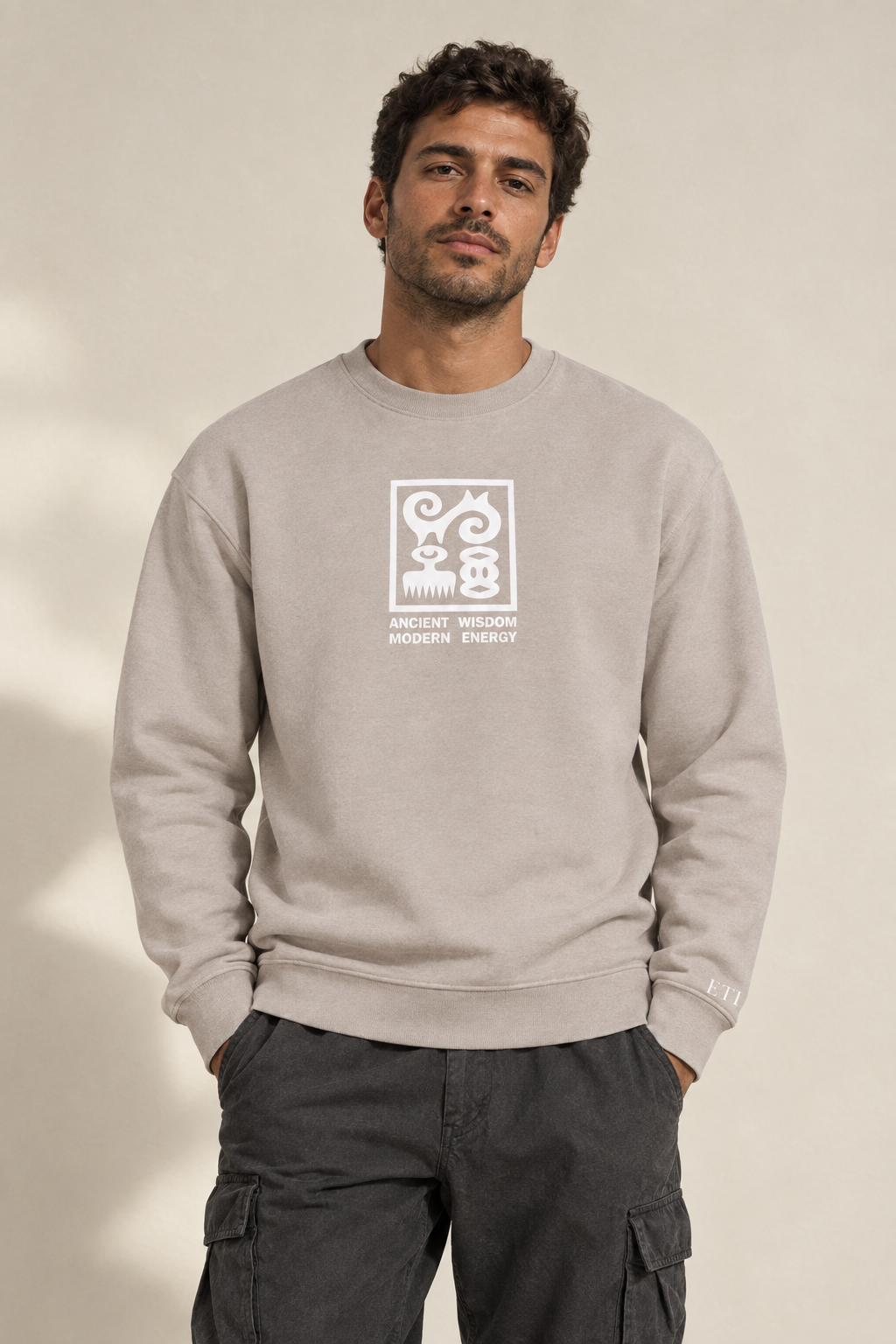 Stone Ancient Wisdom sweatshirt with white artwork